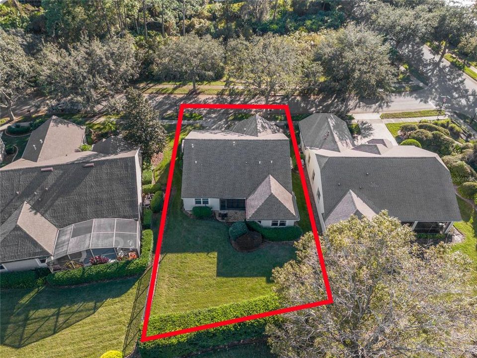 Aerial view of the home's location w/ a conservation area across the street