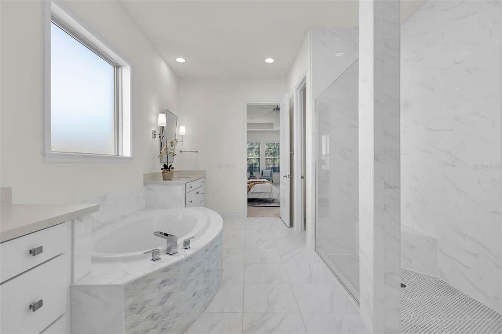 Primary Bathroom provides plenty of natural light.