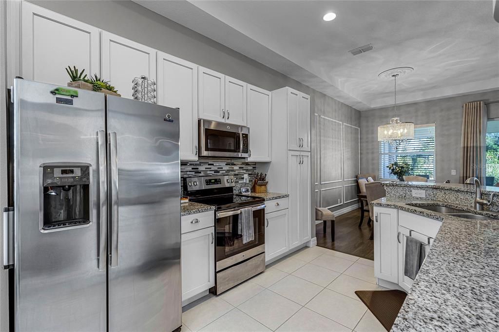 Kitchen is functional and convenient for serving the dining area