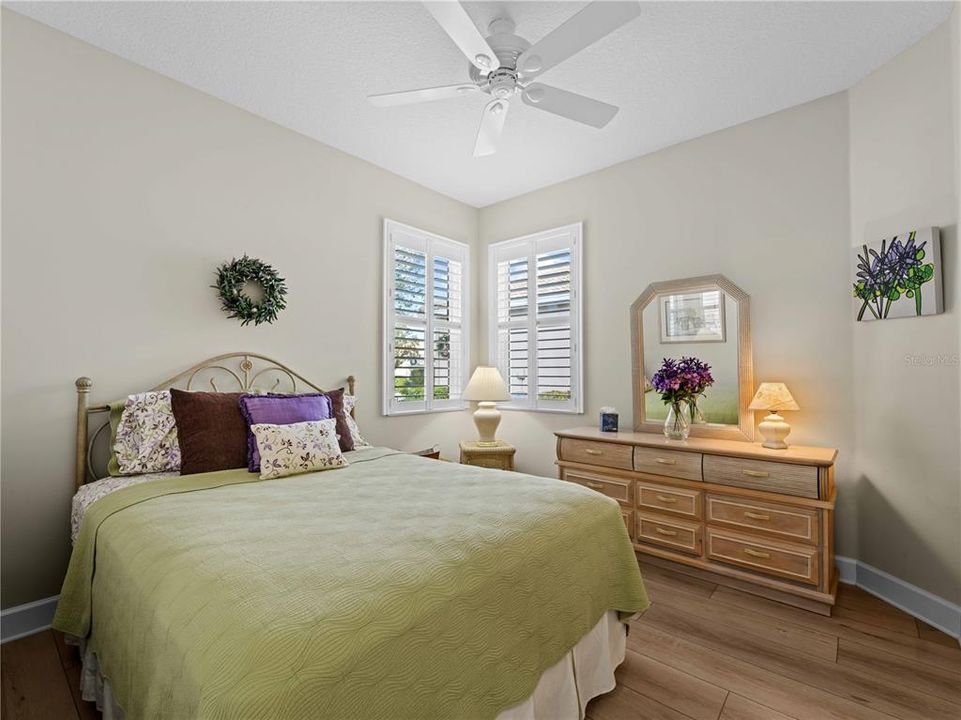 Cozy Guest/Second Bedroom with custom built-in feature closet.