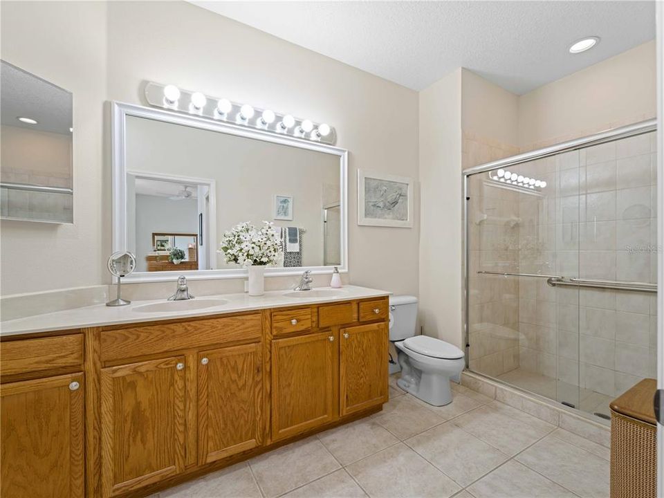 Primary Dual Sink Bathroom with Linen Closet