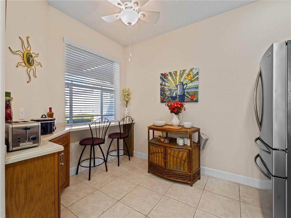 Bright and Airy Kitchen with Ceiling Fan.