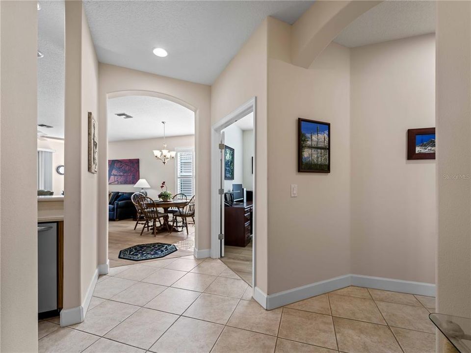 Hallway connecting Kitchen, Living/Dining Room, Office and entrance to the Second Bedroom area of home.