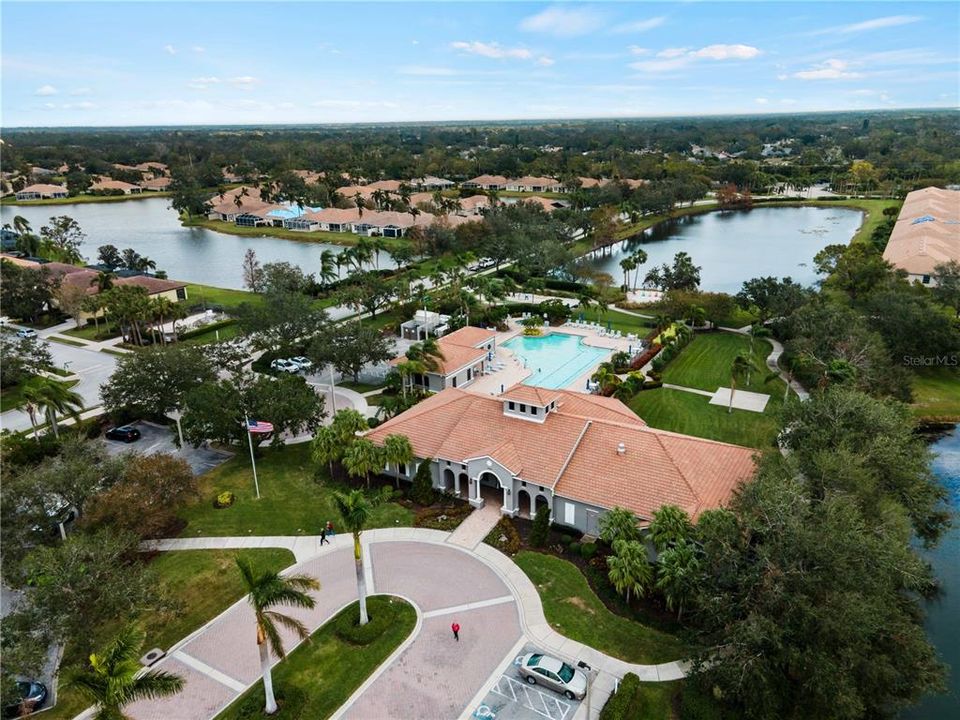 Main entrance to Club House showing  beautiful grounds and the many lakes throughout the community