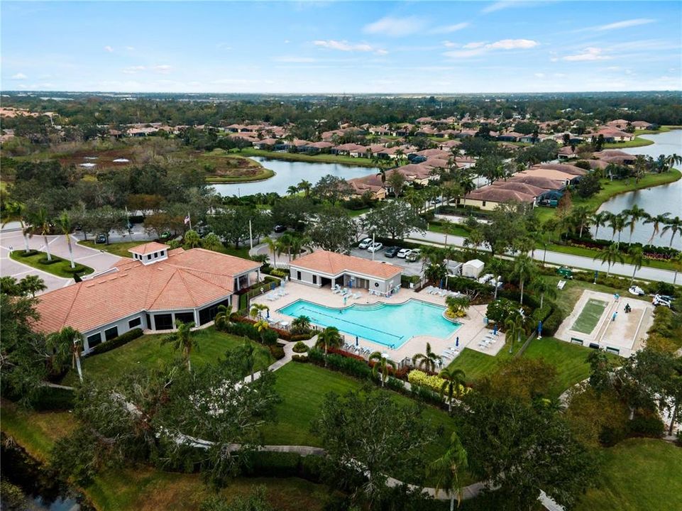 Aerial View of Club House, Pool Area with Pool House, Spa and under construction New Bocce Court.