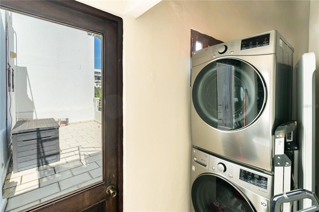 Laundry with entrance to second terrace