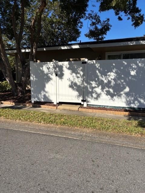 Fenced back porch