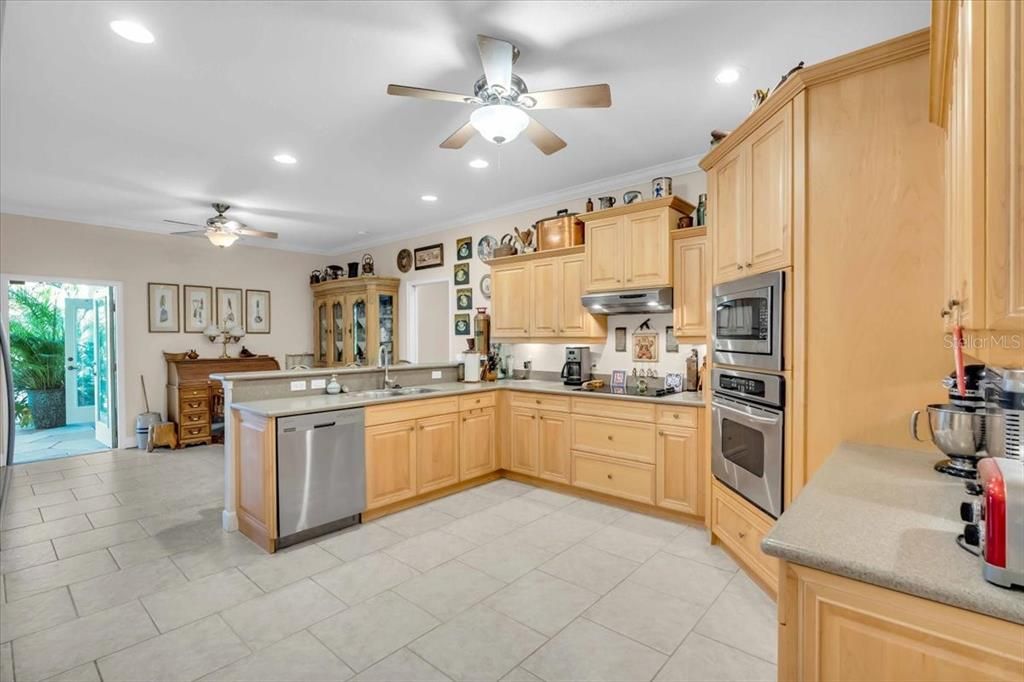 Largest Gourmet Chef's Kitchen with Custom Wood Cabinetry of Main Residence at Tall Palms Ranch