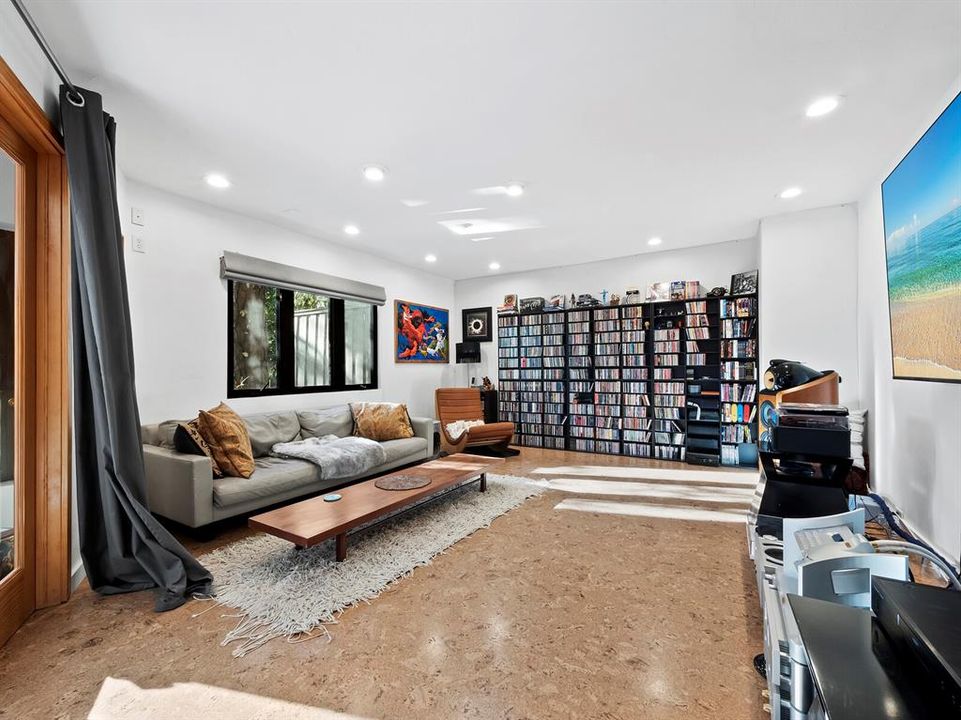 The media room has home theater features and a sound-absorbing cork floor.  Could easily become a 4th bedroom if desired.