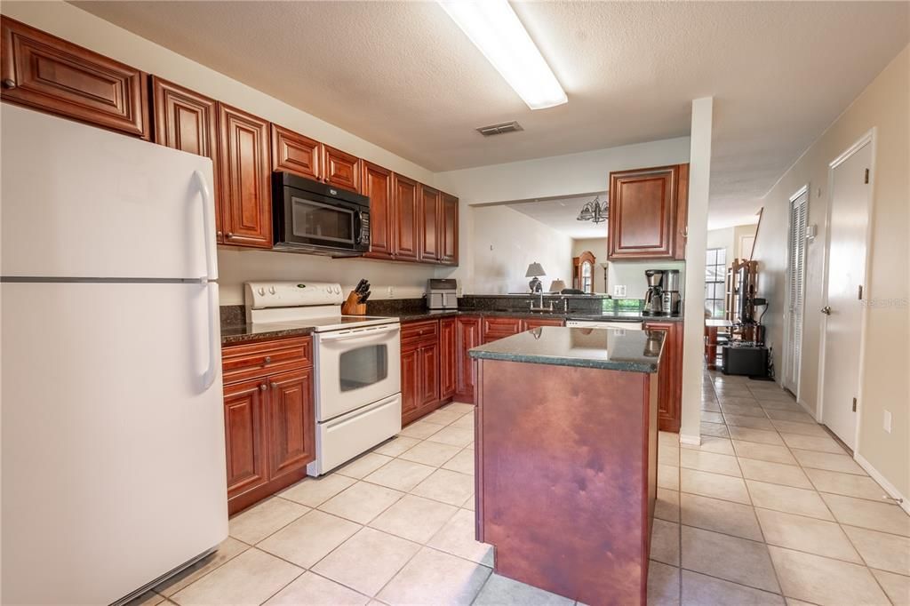 The kitchen has a convenient pass-thru to the dining room.