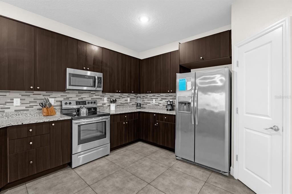 Kitchen comes with stainless steel appliances