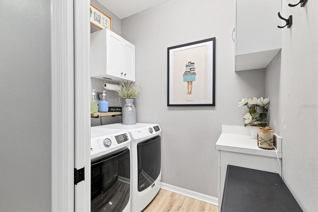 Laundry room with storage