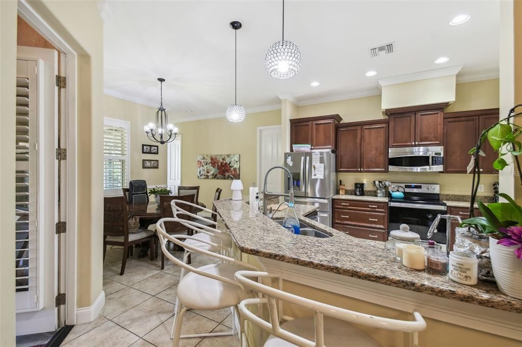 Kitchen with Dinette and door on left to Patio