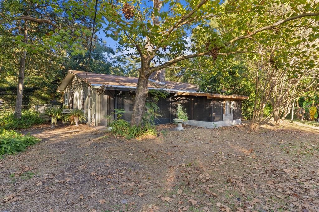 Home front side with screened in porch