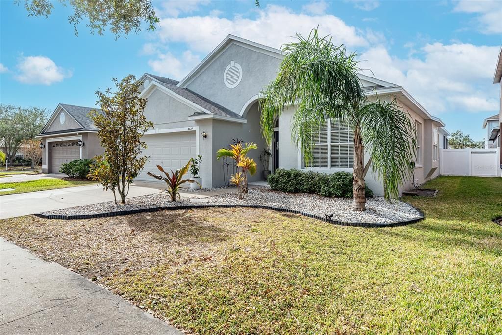 The curb appeal has florida friendly landscaping.