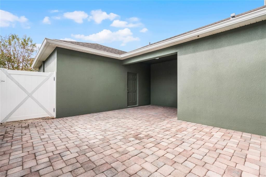 Great full patio space and a covered patio area too. Completely fenced back courtyard.