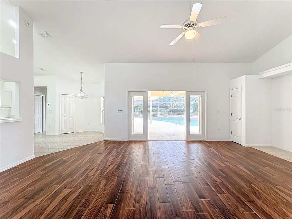 Living Room with French doors the to pool