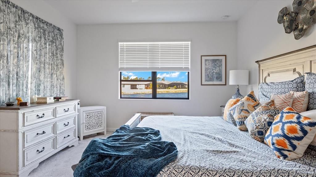 PRIMARY BEDROOM WITH LAKE VIEW