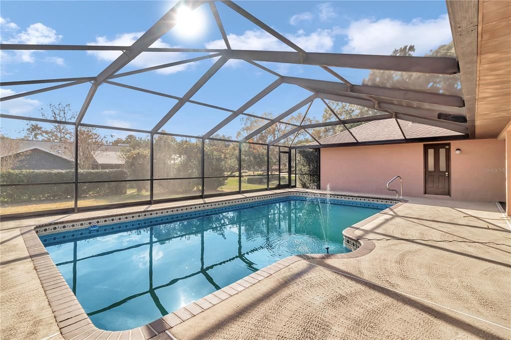 Screened pool enclosure