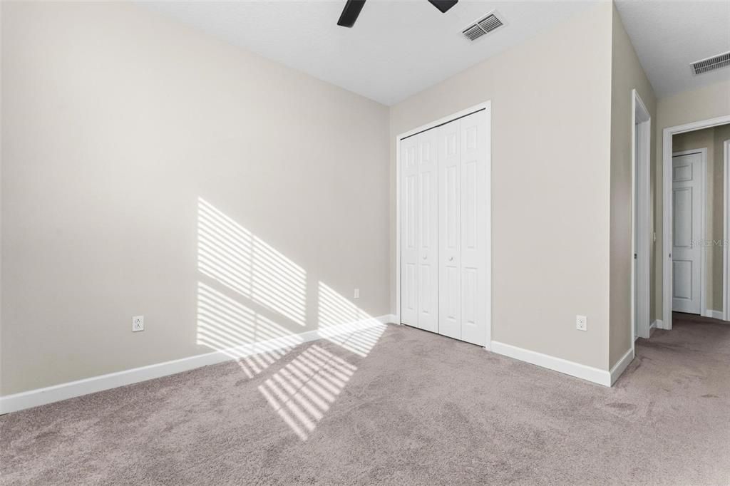 Bedroom 3's large closet with 8' doors for each access to items high up.