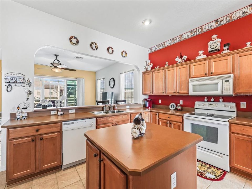 Kitchen w/Generous breakfast bar & double sink