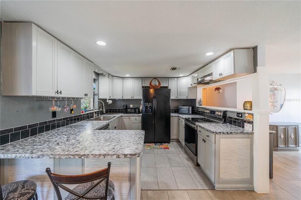 NEW KITCHEN HARDWARE AND TILED FLOORING