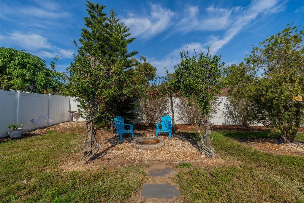 ARBOR IN BACK YARD WITH FIREPIT