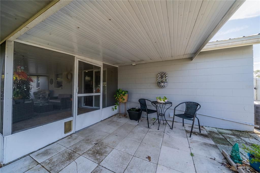 COVERED PATIO, WITH DOGGIE DOOR FROM LANAI, IS A GREAT PLACE TO DO SOME GRILLING