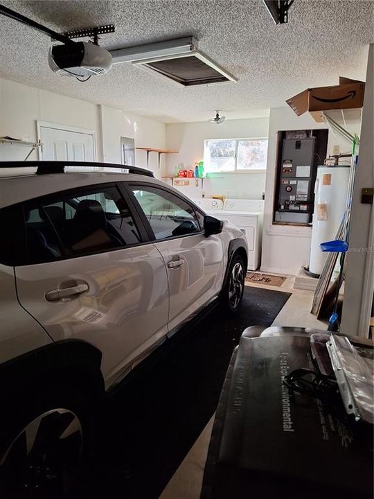 ONE CAR GARAGE WITH LAUNDRY AREA