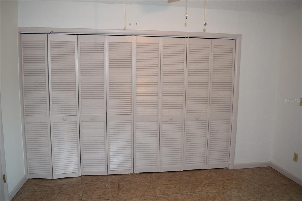 Large closet wall in bedroom