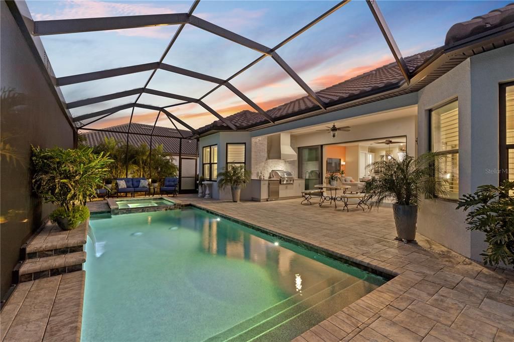 Outdoor patio featuring saltwater/chlorine pool.