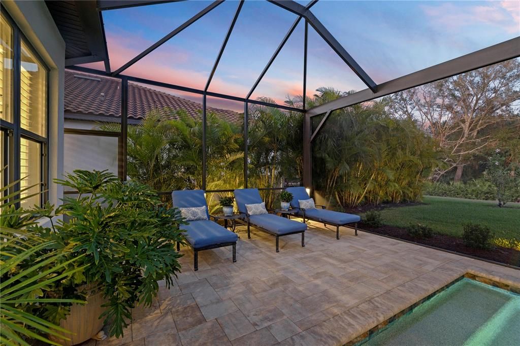 Outdoor patio featuring plenty of space for sitting.