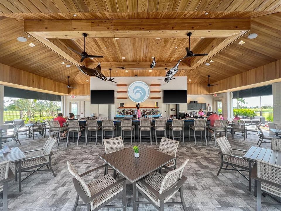 Community photo featuring out door seating at the Bahama Bar.