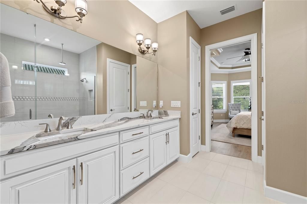 Owner's master bathroom with dual sinks.