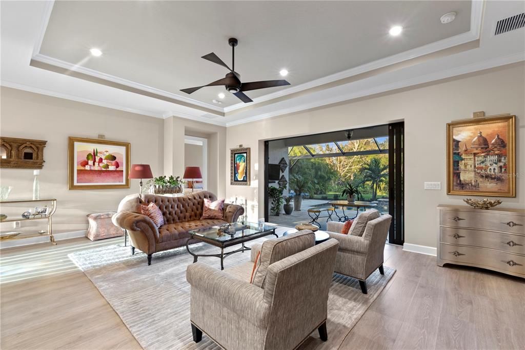 Living space featuring pocket sliders to lead to the back patio.