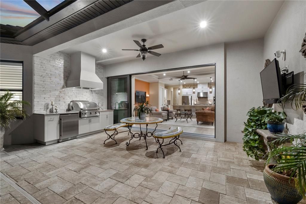 Outdoor patio featuring full kitchen equipped for a grill master!