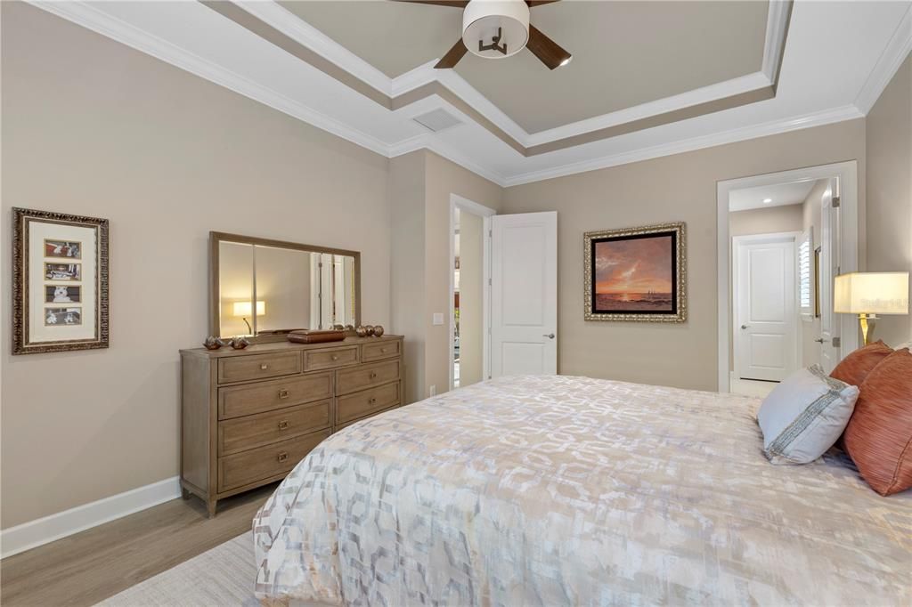 Second Owner's suite featuring tray ceilings and crown molding.