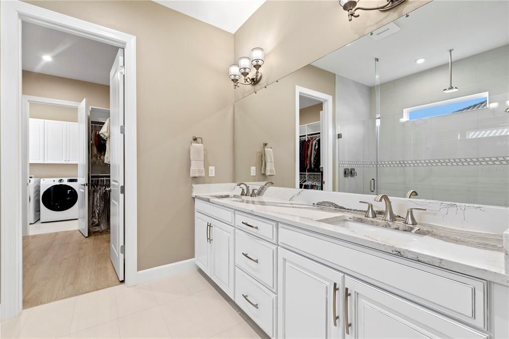 Owner's master bathroom with dual sinks.