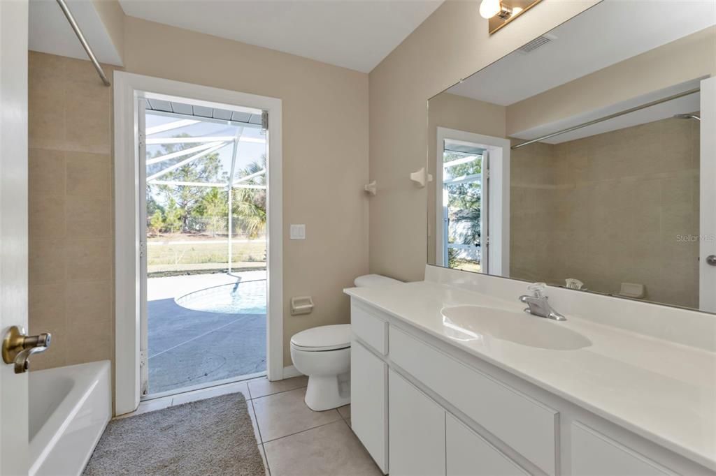 Guest bathroom has access to pool.