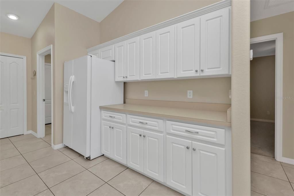 Kitchen: abundance of cabinets and counter space.