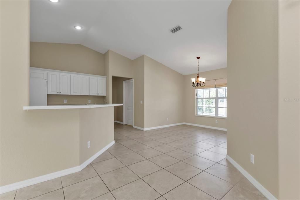 Kitchen opens to dining room area.