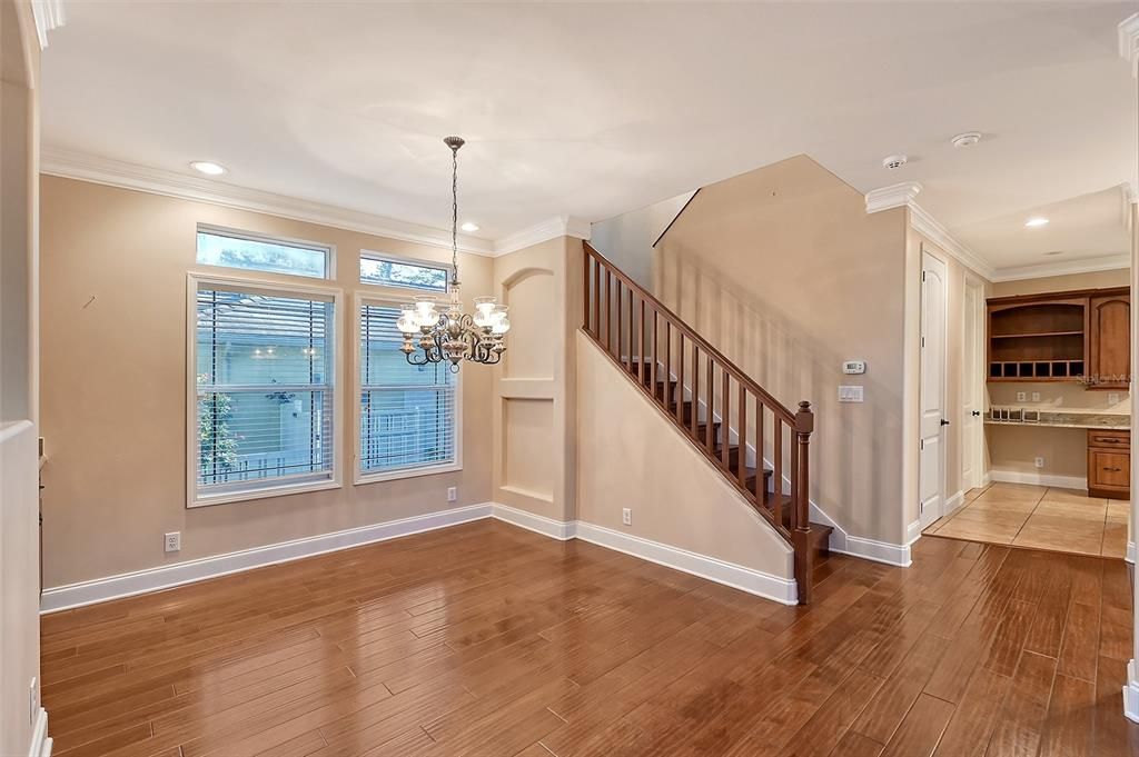 Dining room, Desk built in and stairs to upper second floor.