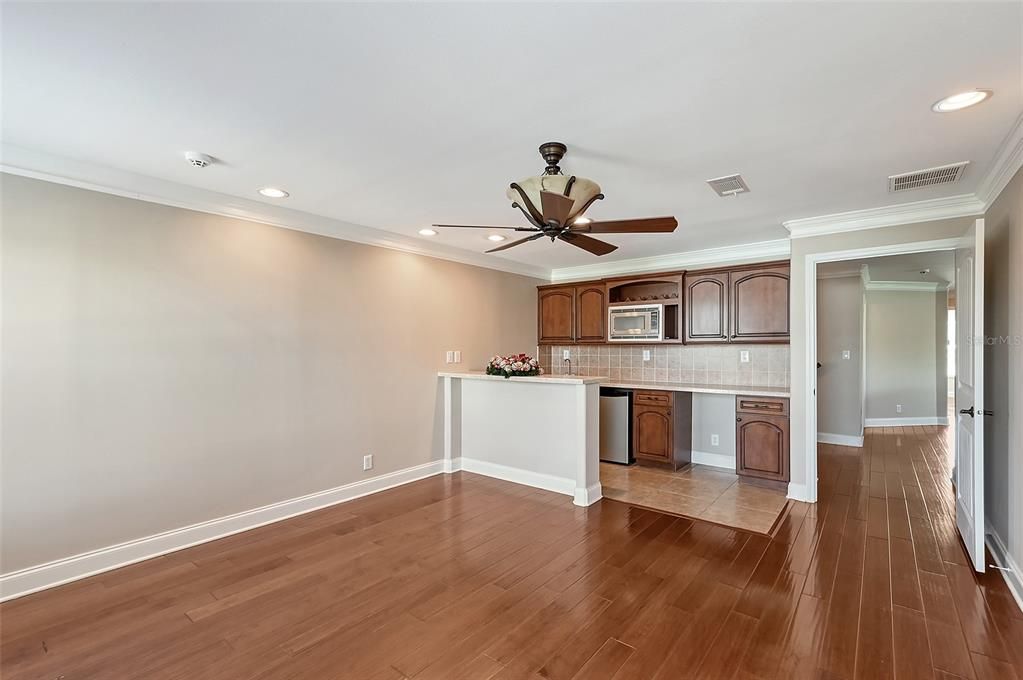 Great Room view of wet bar, mini refrigerator, microwave, cabinetry - second floor.