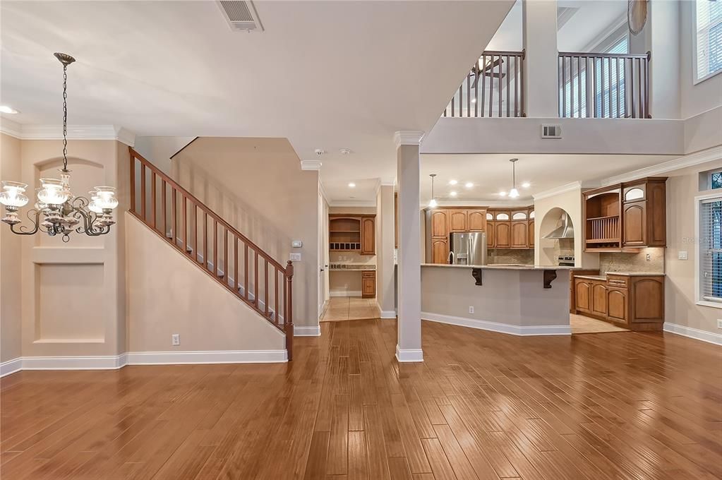 Dining Room, Kitchen, and stairs to second level view.