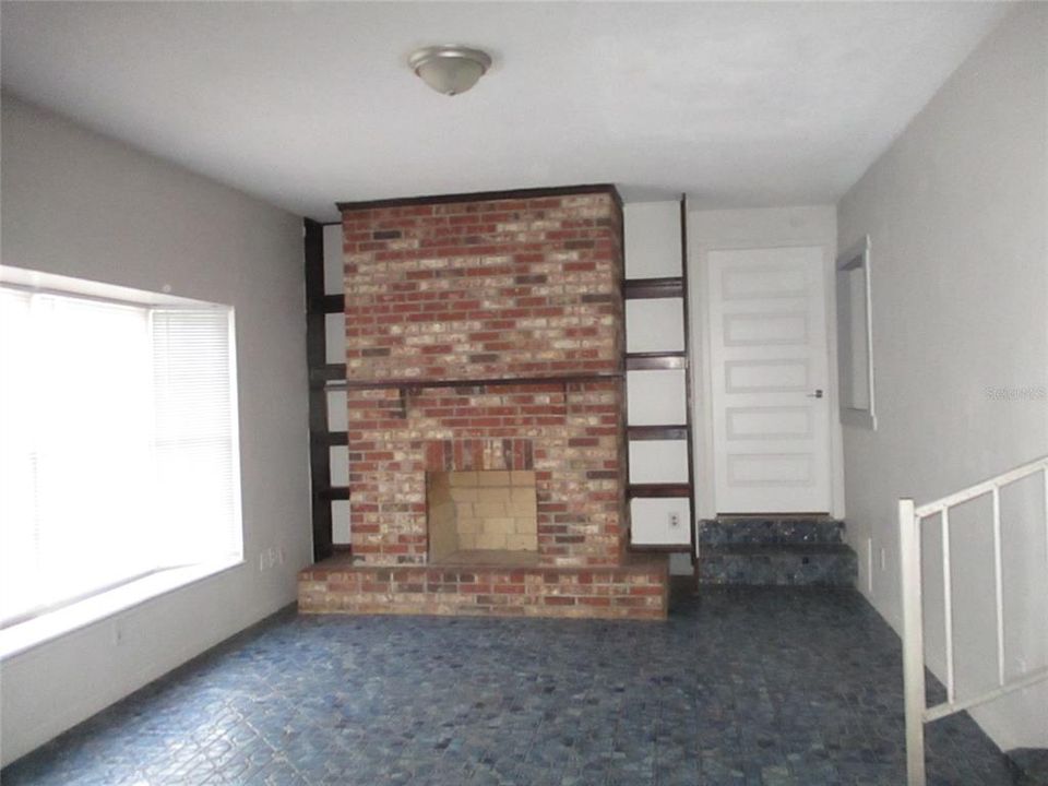 Walk into this large living/family room