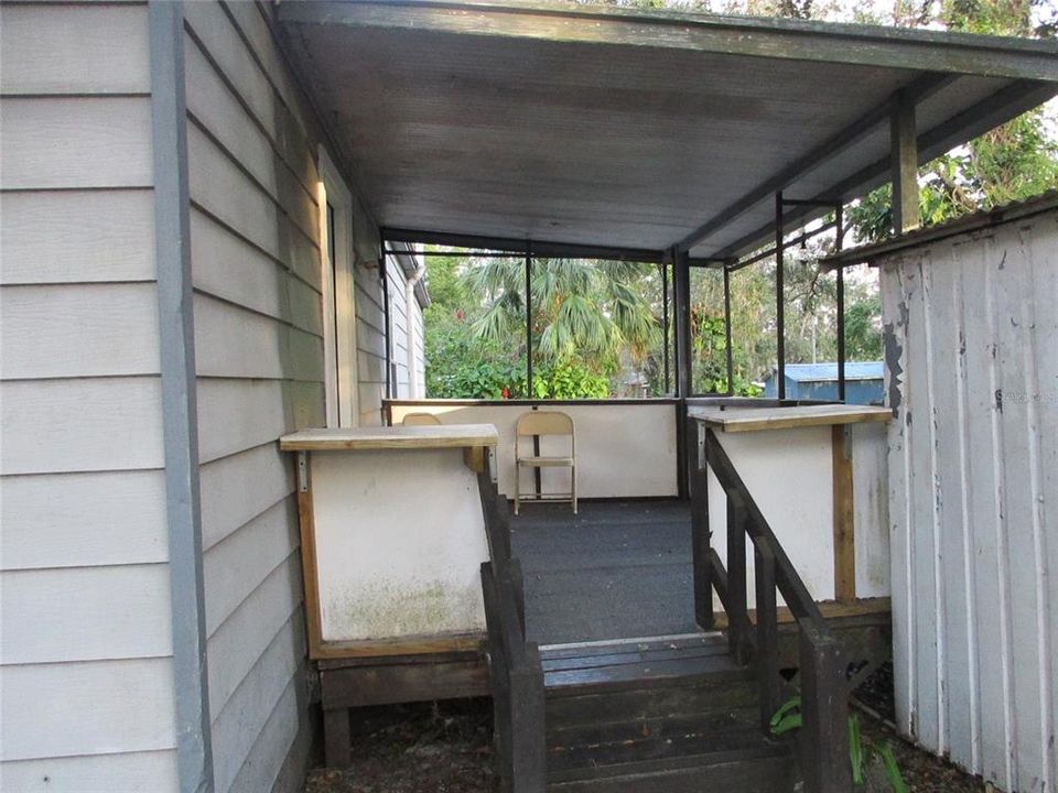 Back porch to utility for washer and dryer