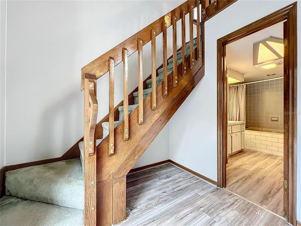 Staircase to loft over 2nd floor primary bedroom