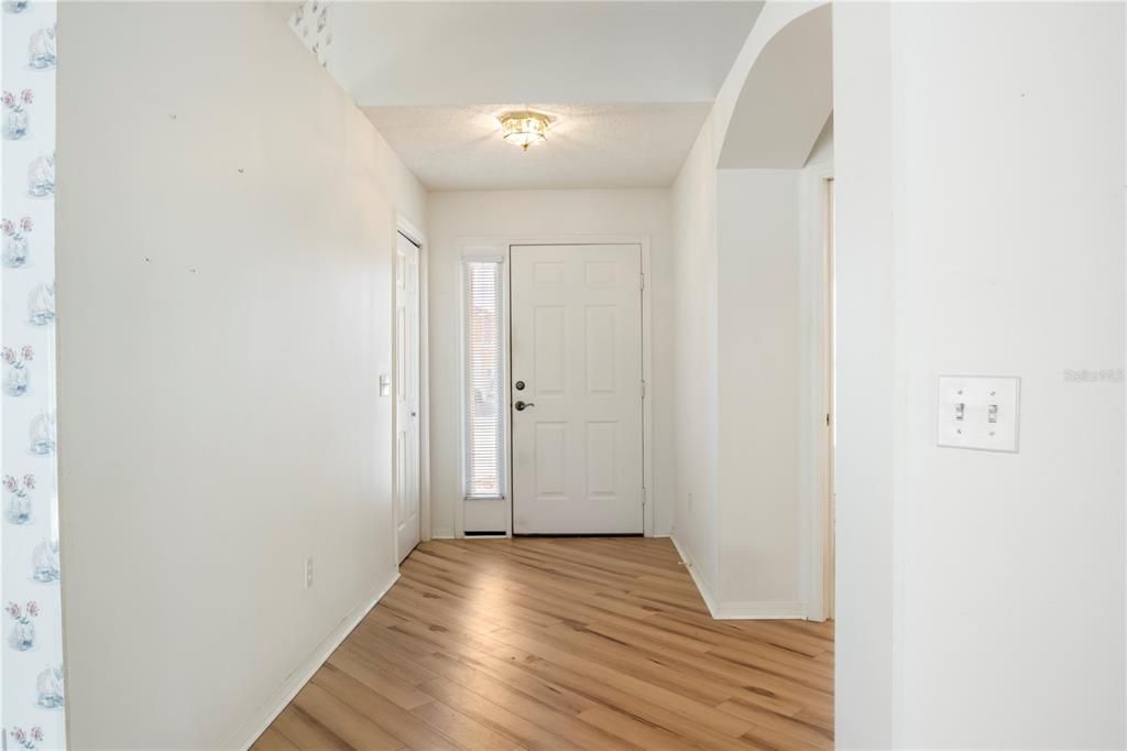 Front entryway with coat closet