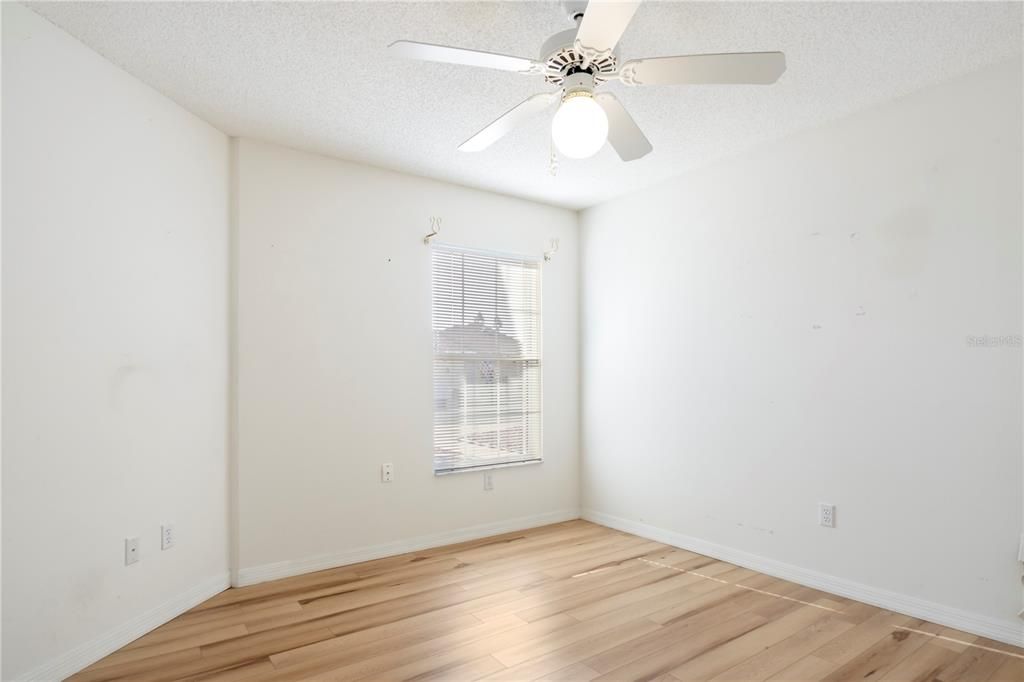 Second bedroom office.  Window facing street view.