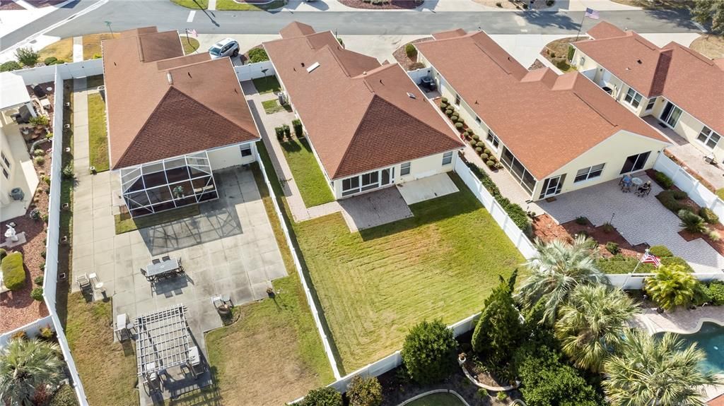 Ariel view showing back of property.  Patio and hot tub pad.